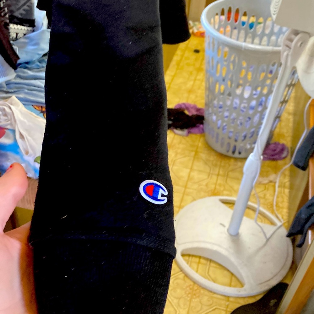 Champion jacket black on the outside and the inside of the the hoody is grey